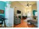 Open living room area with vaulted ceiling, cozy seating, hardwood floors and lots of natural light at 406 Spyglass Hill Pl, Salisbury, NC 28144