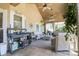 Spacious screened porch with stylish seating and ceiling fans, ideal for relaxing outdoors at 406 Spyglass Hill Pl, Salisbury, NC 28144