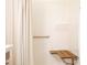This bathroom includes a hand bar and a seat in the shower at 407 Knops Nob Rd, Mooresville, NC 28115