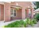 Brick home with cozy covered porch and inviting curb appeal at 407 Knops Nob Rd, Mooresville, NC 28115