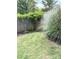 Landscaped backyard with wooden privacy fence at 4204 Canipe Dr, Charlotte, NC 28269