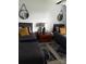 Bedroom with two twin beds, mirrors on the walls and neutral colors at 4204 Canipe Dr, Charlotte, NC 28269
