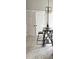 The dining area has a long, high-top table with barstool seating and decorative tile flooring at 4204 Canipe Dr, Charlotte, NC 28269