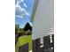Vinyl sided home with fenced yard and view of treeline at 4204 Canipe Dr, Charlotte, NC 28269