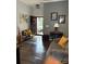 Comfortable living room with hardwood floors, warm light and neutral paint at 4204 Canipe Dr, Charlotte, NC 28269