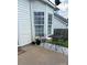 Relaxing patio with metal furniture and view of the backyard at 4204 Canipe Dr, Charlotte, NC 28269