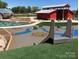 Fun community playground with interactive water features and creative play areas for children at 4204 Canipe Dr, Charlotte, NC 28269
