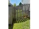 Side yard featuring a wood fence with grass at 4204 Canipe Dr, Charlotte, NC 28269