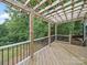 Wooden deck with pergola is perfect for enjoying the outdoors at 430 Edgegreen Dr, Charlotte, NC 28217