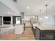 Modern kitchen featuring a granite island, stainless steel appliances, and an open layout at 430 Edgegreen Dr, Charlotte, NC 28217