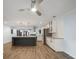 A spacious open-concept kitchen boasting stainless steel appliances and a large granite-topped island at 430 Edgegreen Dr, Charlotte, NC 28217