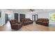 Open living space features wood floors, neutral walls, and modern ceiling fan at 430 Edgegreen Dr, Charlotte, NC 28217