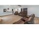 Spacious living room boasts wood flooring, recessed lighting, and an open layout at 430 Edgegreen Dr, Charlotte, NC 28217