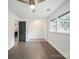 Open-concept living area boasts hardwood floors and modern archway detail at 430 Edgegreen Dr, Charlotte, NC 28217