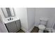 Updated half bathroom with a new vanity and toilet at 4501 E Highway 27 Hwy, Iron Station, NC 28080