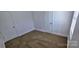 Neutral bedroom features neutral carpet, fresh white trim, and natural light at 4501 E Highway 27 Hwy, Iron Station, NC 28080