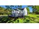 Exterior angle shot of home featuring a covered deck at 4501 E Highway 27 Hwy, Iron Station, NC 28080