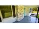 Charming front porch with rustic brickwork and teal door at 4501 E Highway 27 Hwy, Iron Station, NC 28080