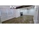Inviting living room features a brick fireplace and ample natural light at 4501 E Highway 27 Hwy, Iron Station, NC 28080