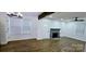 Bright, spacious living room with multiple windows and wood flooring at 4501 E Highway 27 Hwy, Iron Station, NC 28080