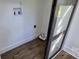 Utility room featuring modern gray sliding door closet and washer/dryer hookups at 4501 E Highway 27 Hwy, Iron Station, NC 28080