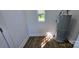Clean utility room featuring gray water heater at 4501 E Highway 27 Hwy, Iron Station, NC 28080