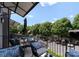 Cozy balcony with patio furniture offers a relaxing outdoor space and neighborhood views from the balcony at 460 E 33Rd St, Charlotte, NC 28205
