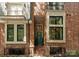 Attractive townhome exterior with brick facade, modern windows, and inviting entrance at 460 E 33Rd St, Charlotte, NC 28205