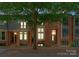 Charming brick townhomes with well-maintained landscaping and inviting entrances at 460 E 33Rd St, Charlotte, NC 28205