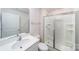Bathroom with a single sink vanity and glass door shower at 462 Janie Cir # 100, Newton, NC 28658