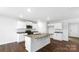 Modern kitchen featuring white cabinetry, granite countertops, and stainless steel appliances at 462 Janie Cir # 100, Newton, NC 28658