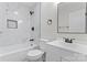 Updated bathroom features a modern vanity and stylish marble look tile shower at 5534 Great Wagon Rd, Charlotte, NC 28215