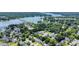 Aerial view of 584 Williamson Rd, a waterfront property with lake access surrounded by homes and trees at 584 Williamson Rd, Mooresville, NC 28117