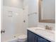 Modern bathroom featuring tiled shower and vanity with marble countertop at 584 Williamson Rd, Mooresville, NC 28117