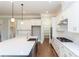 Well-equipped kitchen with sleek countertops, stainless steel appliances, and a convenient pantry at 584 Williamson Rd, Mooresville, NC 28117