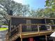 A spacious back deck offers a private outdoor living space with mature trees at 6616 Love Mill Rd, Monroe, NC 28110