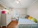 Cozy bedroom featuring hardwood floors, a ceiling fan, and cute decor at 6616 Love Mill Rd, Monroe, NC 28110