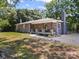 Charming single-story home featuring stone accents, a covered porch, and a well-maintained front yard at 6616 Love Mill Rd, Monroe, NC 28110