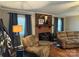 Inviting living room with a brick fireplace, comfortable seating, and stylish accents at 6616 Love Mill Rd, Monroe, NC 28110