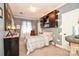 Cozy bedroom featuring a built-in bookshelf with lights and a comfortable single bed at 711 Yadkin St, Albemarle, NC 28001