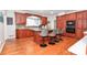 Spacious kitchen with custom wood cabinets, granite countertops, stainless steel appliances, and a center island at 711 Yadkin St, Albemarle, NC 28001