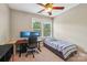 Bright bedroom features a study area with ample desk space and natural light from a large window at 739 Terrace Park, Rock Hill, SC 29730