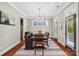 Dining room with hardwood floors, elegant chandelier, and a view to the outside at 739 Terrace Park, Rock Hill, SC 29730