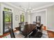 Dining room with access to porch, wood flooring, neutral color, and modern chandelier at 739 Terrace Park, Rock Hill, SC 29730