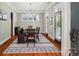 Dining room with hardwood floors, elegant chandelier, and a view to the outside at 739 Terrace Park, Rock Hill, SC 29730