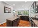 Open kitchen featuring stainless steel appliances, wood floors and a view into the living area at 739 Terrace Park, Rock Hill, SC 29730