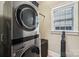 Convenient laundry room featuring a modern, stacked washer and dryer for efficient space-saving design at 739 Terrace Park, Rock Hill, SC 29730