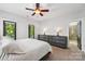 Elegant main bedroom boasts balcony access and modern furniture, combining style and relaxation at 739 Terrace Park, Rock Hill, SC 29730