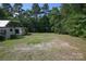 Spacious backyard with a shed and ample space for outdoor activities at 7645 Robinson Church Rd, Harrisburg, NC 28075