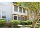 Traditional multi-level home showcasing manicured landscaping and a classic front entrance at 8266 Knights Bridge Rd, Charlotte, NC 28210